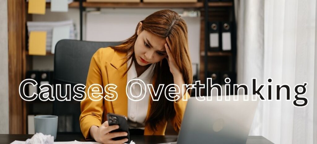 A stressed woman at her desk looking at her phone, with the text "Causes Overthinking" overlayed on the image.